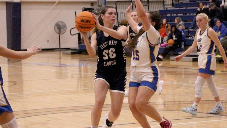 Penn State DuBois freshman forward Elizabeth Hungiville handles the basketball in the lane during a recent game away from home when the Lady Lions visited Pitt Bradford.